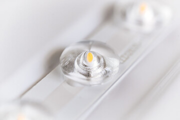 Fototapeta na wymiar close-up. Strip with LED bulbs on a white surface. 