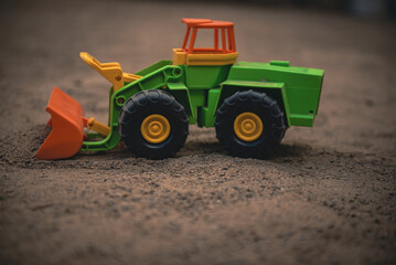 Construction equipment grader and excavator. Toy excavator. Construction