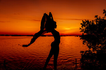 A Lovely Latin Model PosesAs The Sun Rises In The Caribbean