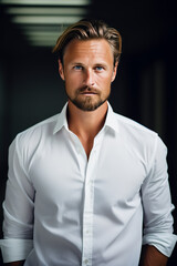 Obraz premium Portrait of a 35 year old German wearing a white shirt.