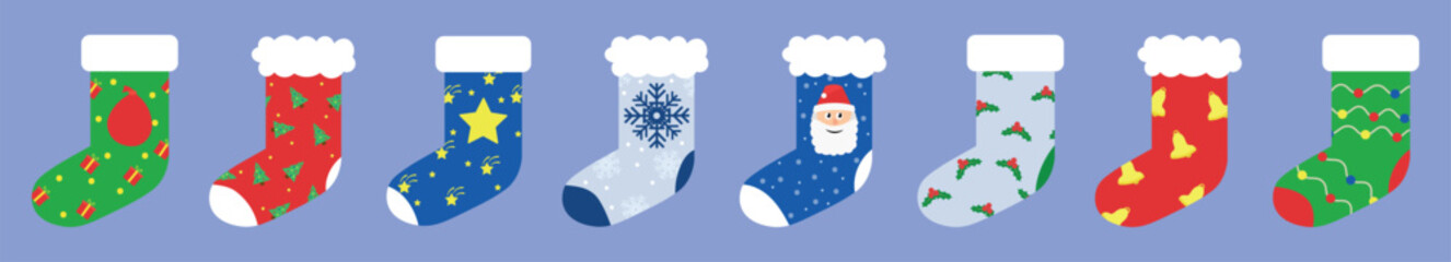 Many beautiful Christmas socks on color background