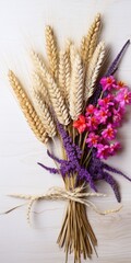 a bunch of wheat and flowers