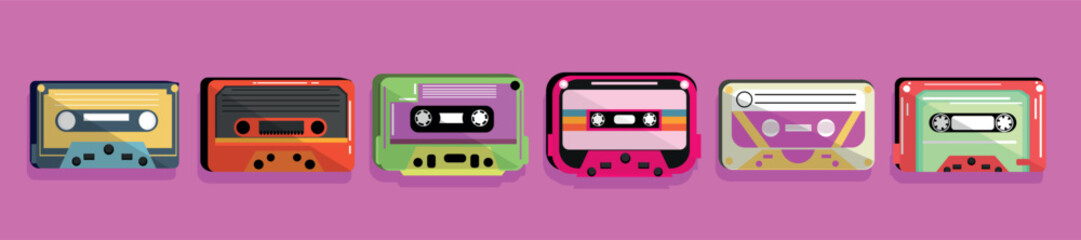 Set of audio cassettes on pink background