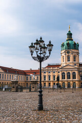 Fototapeta na wymiar Old European churches and street lamps