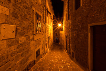 A street in the center of Scarlino, a picturesque medieval town in the Maremma. Italy.