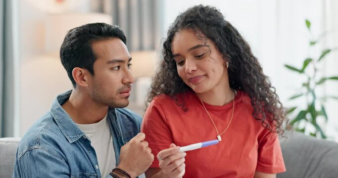Home pregnancy test, results and sad couple on a sofa unhappy in their home together. Pregnant, fail and disappointed people in a living room with testing kit, depression or ivf or infertility crisis