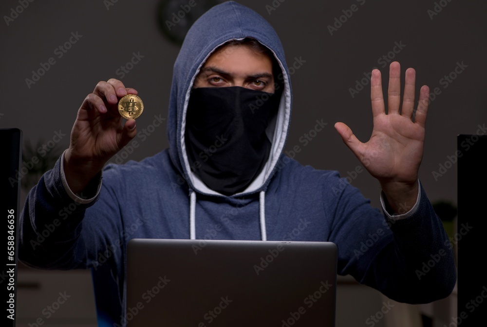 Poster male hacker hacking security firewall late in office