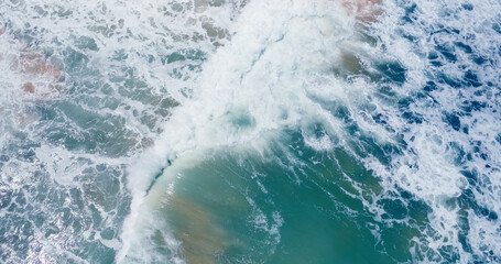 aerial view big power ocean wave on beach sand