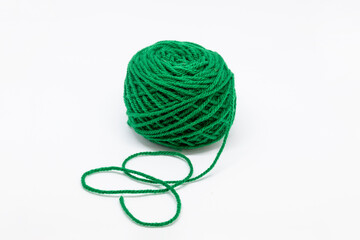 Beautiful bright green wool on a light background.