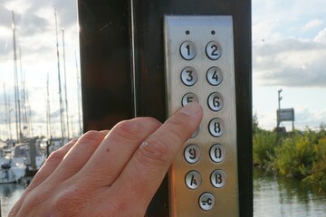 Lock that is opened and closed with a numerical code. Secured and off-limits to unauthorized...