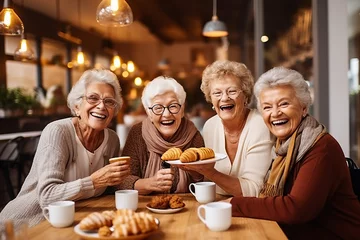 Fotobehang Old ladies have a fun at cafeteria © sderbane