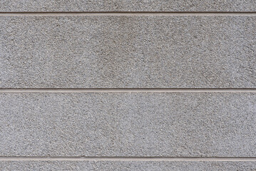 A cement wall with smooth horizontal strips. Vector cement texture background