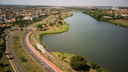 Fototapeta premium Aerial View of Reservoir and Damhas Region - São José do Rio Preto, Sunny Day