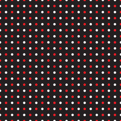 Red and white polka dots on black background,seamless pattern dot circle print for textile, fashion, scrapbook paper, wallpaper. © Worapol