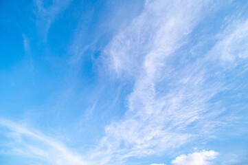 Blue sky and white fluffy tiny clouds background and pattern