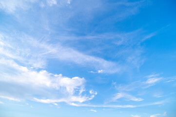 Blue sky and white fluffy tiny clouds background and pattern - 658866621