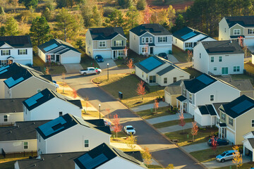 Aerial view of tightly located new family houses in South Carolina suburban area. Real estate development in american suburbs