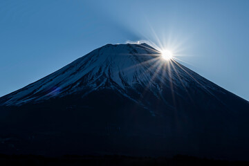 Sunrise on the top of Fuji mountain called Diamond Fuji Phenomenon, Japan