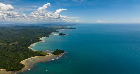 Aerial drone of bays and lagoons with beaches on the coast of the island of Borneo. Sabah, Malaysia.