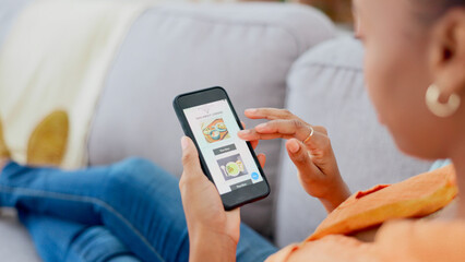 Food delivery, search or phone with hands of black woman on sofa for online shopping on internet. Scroll, screen or African customer browsing on technology ux at home for offer, app menu or choice