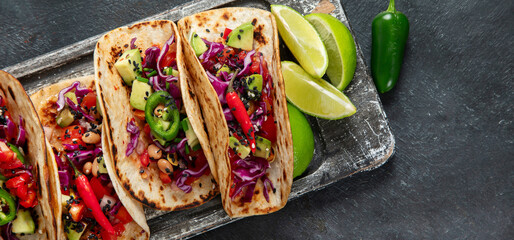 Mexican street tacos flat lay composition with lime, pepper and sauce