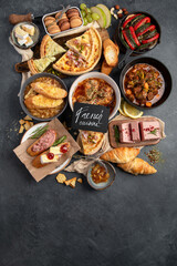 Traditional french food -mussel and meat dishes, ratatouille, snails, croissants, desserts, fresh pastries and cheese.