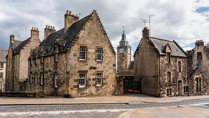 Old buildings with clock tower in the medieval city of Stirling, Scotland.