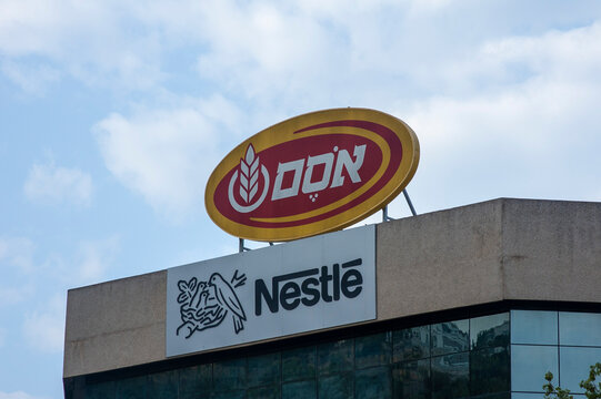 Yokne'am Illit, Israel - 11 14 2022: Osem Investments Ltd. owned by Nestl&eacute; S.A. of Switzerland sign and logo.