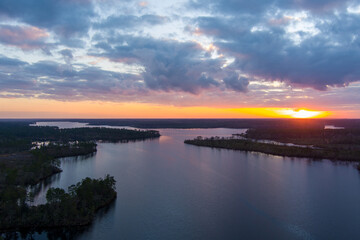 Fototapeta na wymiar Aerial view of a lake at sunset