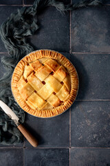 Simple apple pie on blue background