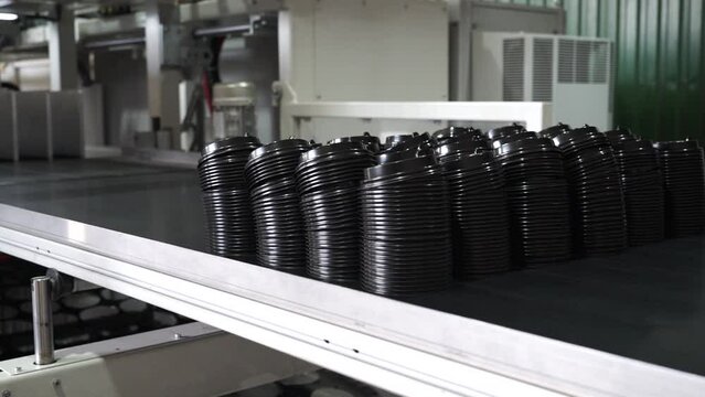 Paper Coffee Cup Lid Making Machine. The plastic injection part manufacturing concept. Plastic Lids for Paper Cups. Thermoform Strawless Lid with Straw Slot for Paper Cup
