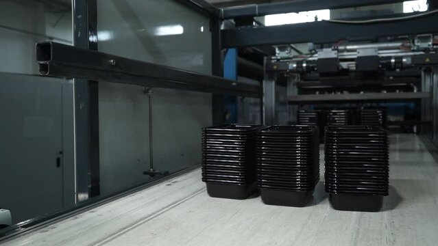 Paper Coffee Cup Lid Making Machine. The plastic injection part manufacturing concept.