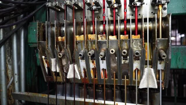 Copper wire is covered with protective layer of varnish. Winding Wire Coating Insulation, Enameled Wire Insulation Varnish. Coil winder machine with jackshafts copper wire drawing die
