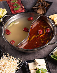 delicious asian bouillon with a lot of extra ingredients, View from above. Chinese cuisine, ingredient for hotpot