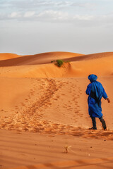 Berber in traditional dress in the Sahara desert.
