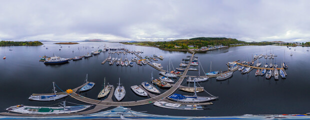 360 VR aerial view of boat marina and surrounding landscapes near Oban, Scotland