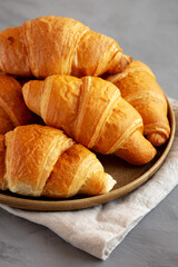 Homemade Croissants on a Plate, side view.