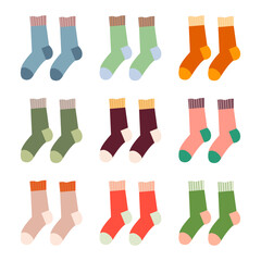 Set Knitted Socks in various colors. Popular hobby. Accessories made of wool and cotton. Flat vector illustration.