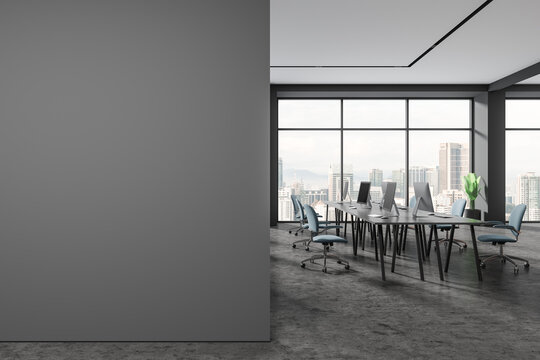 Stylish business coworking interior with panoramic window, mock up wall