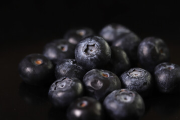 Blueberries isolated on black background