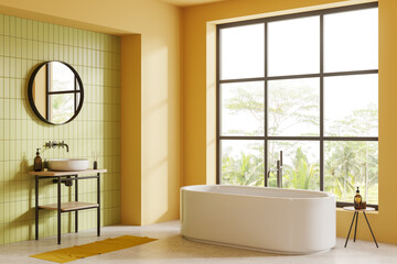 Hotel bathroom interior with tub and sink with accessories, panoramic window