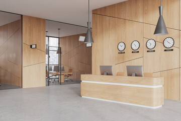 Wooden office hall with reception and clocks