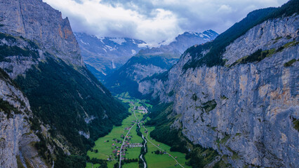 Lauterbrunnen, a picturesque Swiss village nestled in a pristine valley, is a true natural wonder when viewed from above.