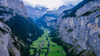 Lauterbrunnen, a picturesque Swiss village nestled in a pristine valley, is a true natural wonder when viewed from above.