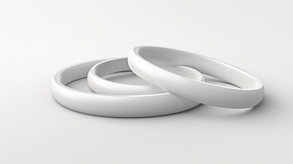 A 3D rendering of white rings intertwined with each other, resting on a white surface. The rings are smooth and glossy, symbolizing unity and harmony.