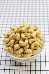 Cashew nuts on white background.