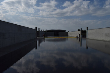 Sapporo Japan October 1 2023 The beautiful blue sky reflected on the quiet water pond at the entrance of the Takino Reien Makomanai