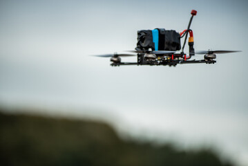 Fototapeta na wymiar fpv drone in fly mode. modern technology