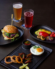 layout with beer burgers and snacks