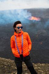 Traveler women near volcano in Iceland in 2023. Travel extreme concept. Hiking in Iceland. Girl...